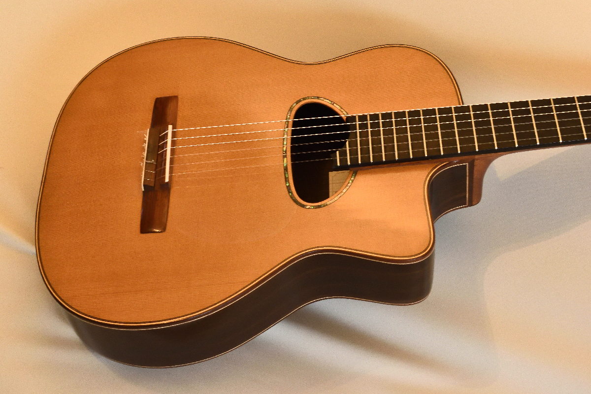 Cedar top Nylon string D hole 